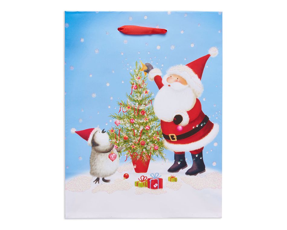 small santa and penguin christmas gift bag